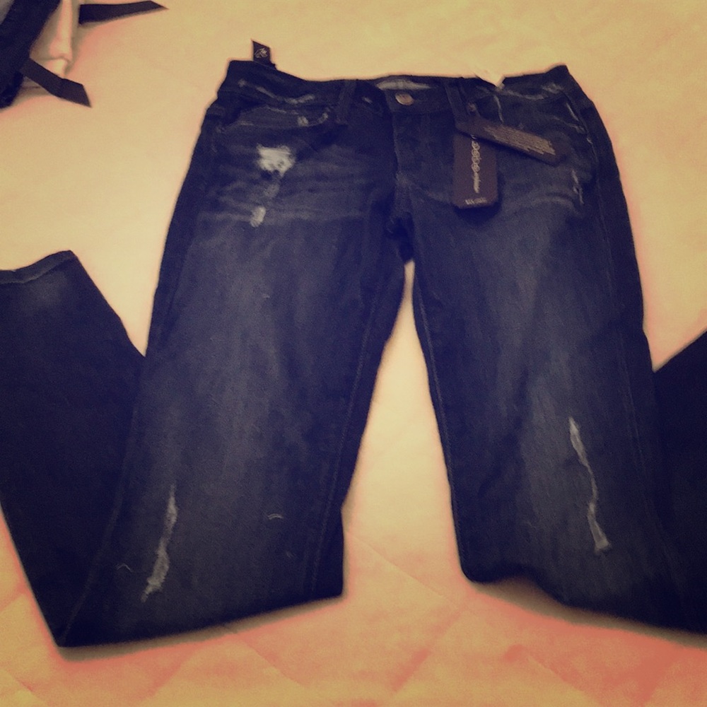 Skinny ripped BeBe jeans NWT